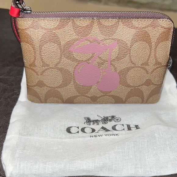 Coach Tan and Pink Cherry Wristlet - Picture 1 of 5